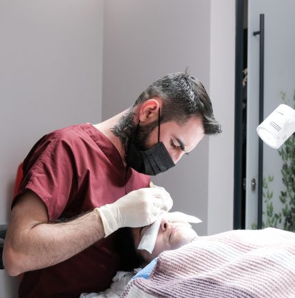 Doctor,Is,Performing,The,Eyebrow,Transplant,Procedure.